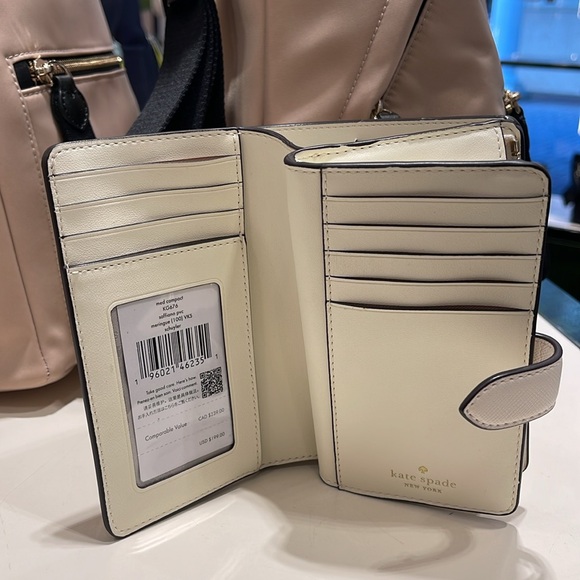 Kate Spade Schuyler Medium Compact Bifold Wallet
Meringue
NWT - Picture 10 of 16